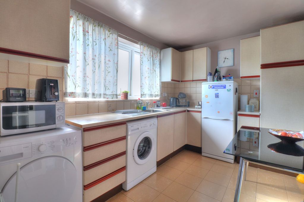Property photo 2 of 12 Kitchen