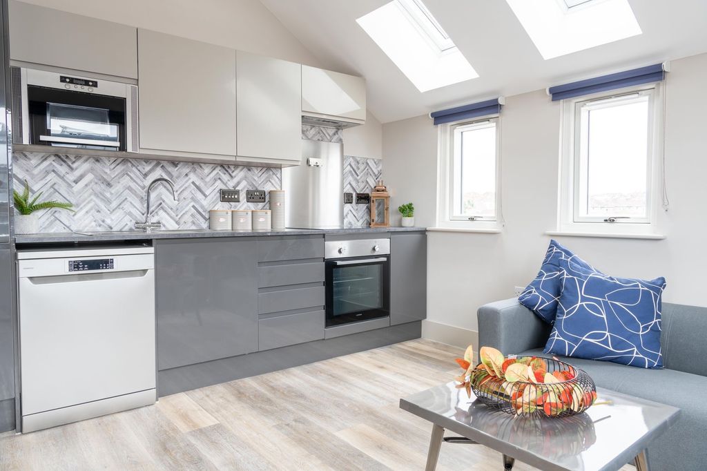 Property photo 1 of 6 Bright And Modern Kitchen With Ample Natural Light...