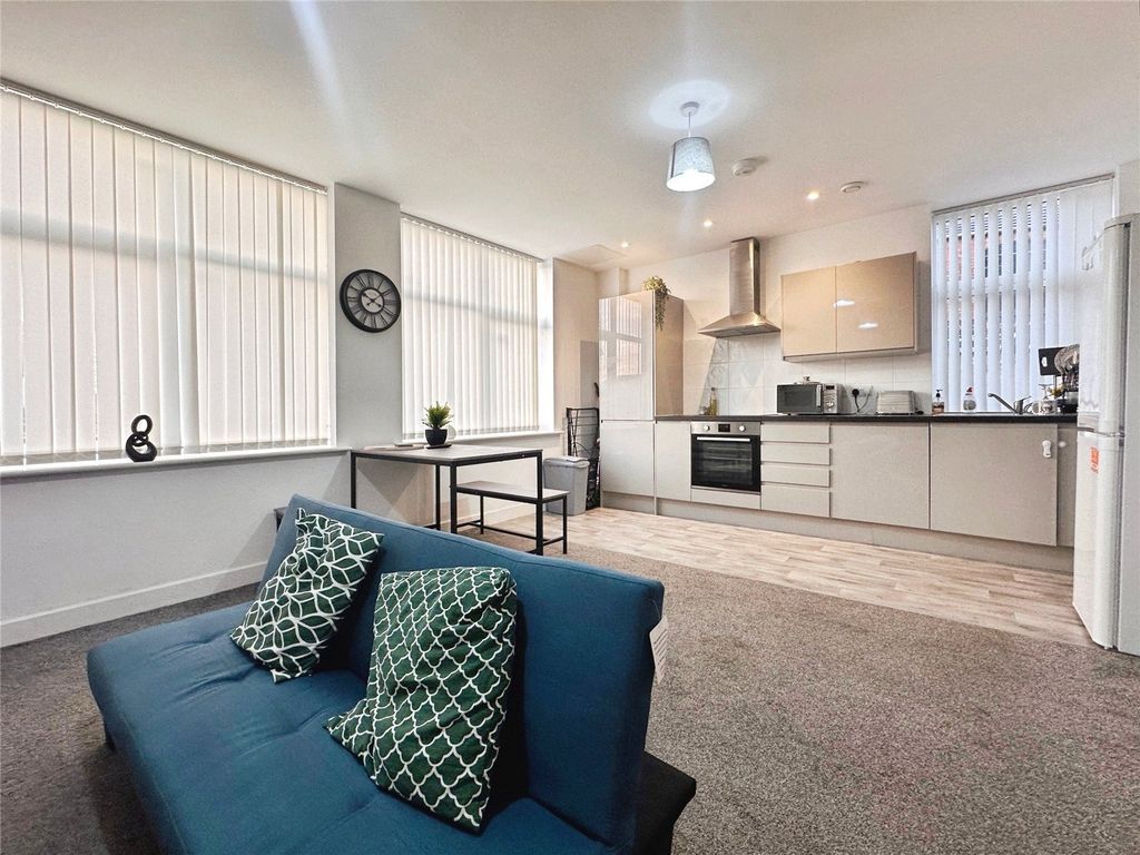 Property photo 1 of 7 Living Area