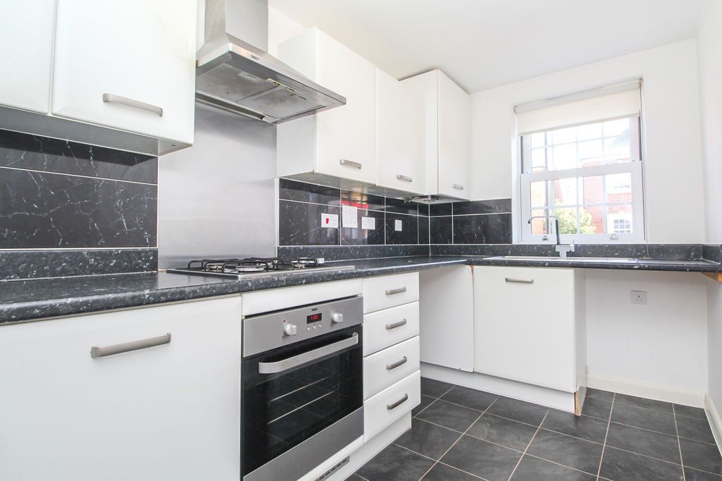Property photo 3 of 12 Kitchen