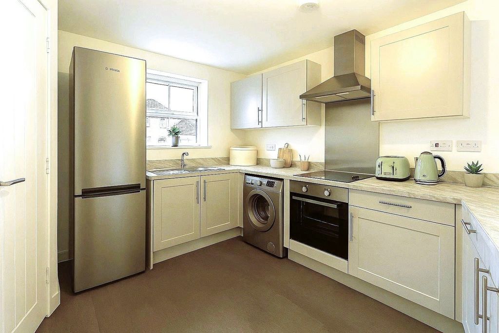 Property photo 2 of 9 Kitchen