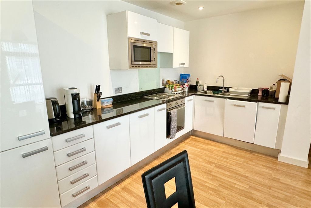 Property photo 3 of 10 Kitchen Area