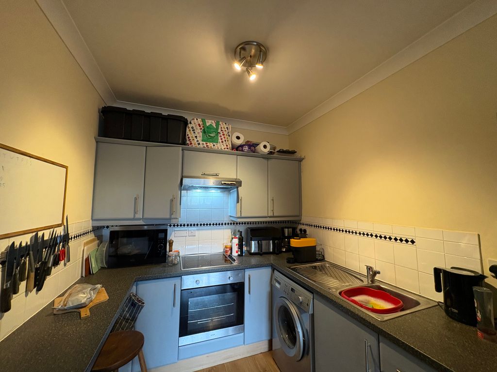 Property photo 3 of 9 Kitchen