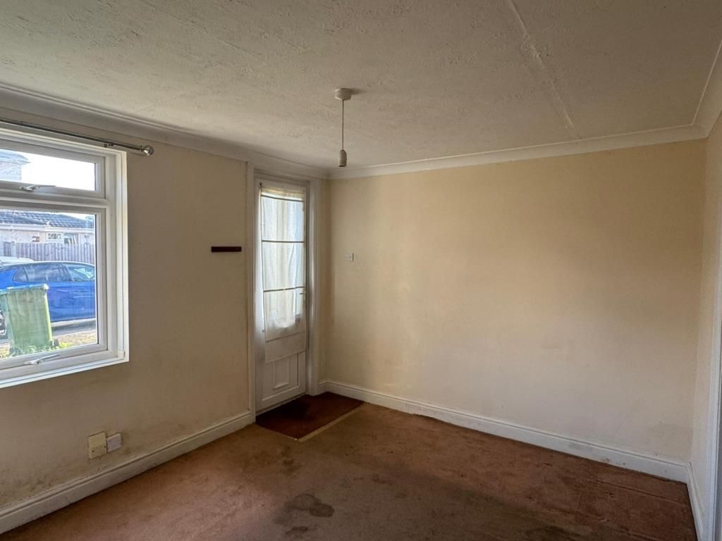 Property photo 3 of 9 Reverse View Of The Living Room Looking Towards The Front Door