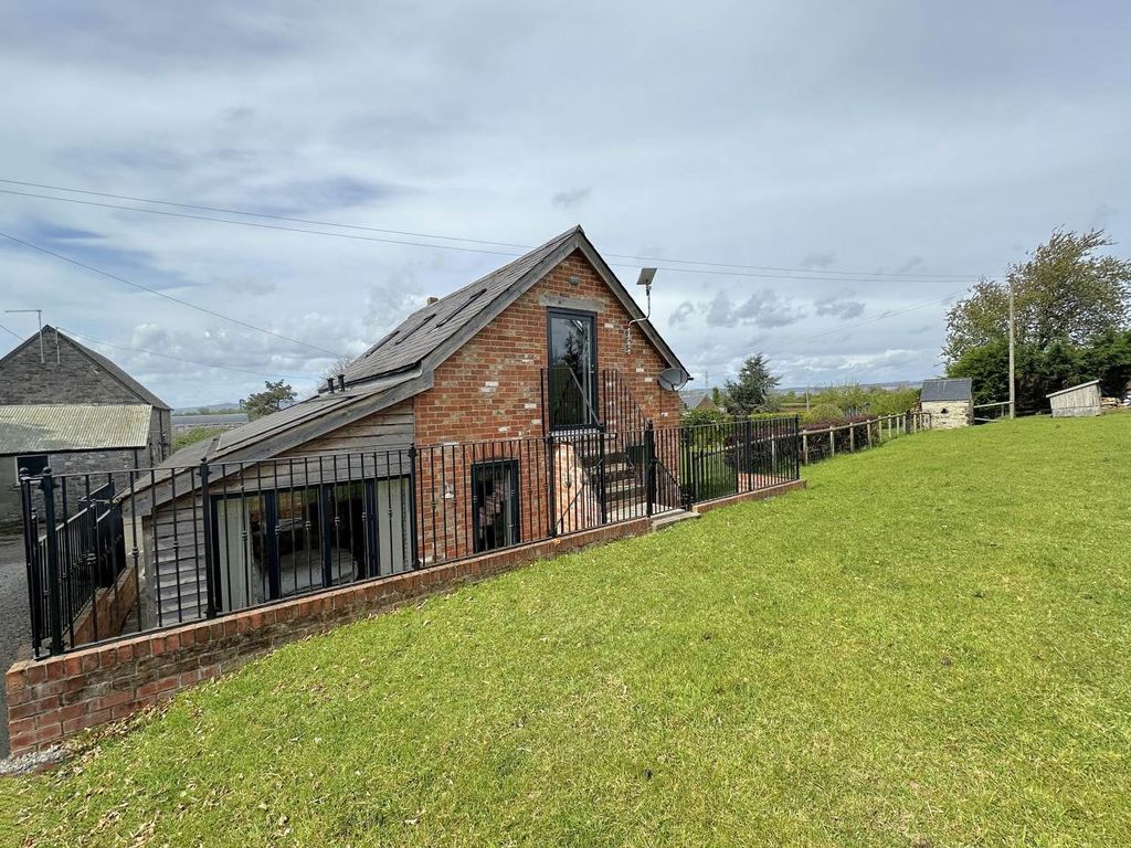 Property photo 2 of 12 Rear