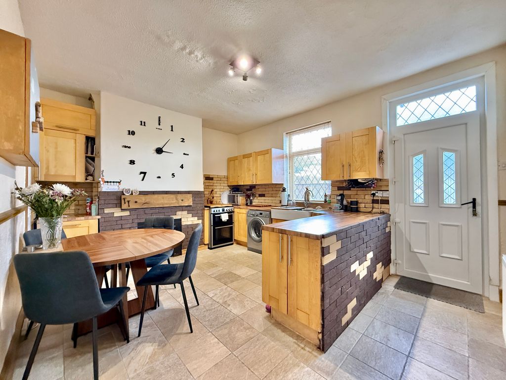 Property photo 2 of 12 Kitchen Dining Room