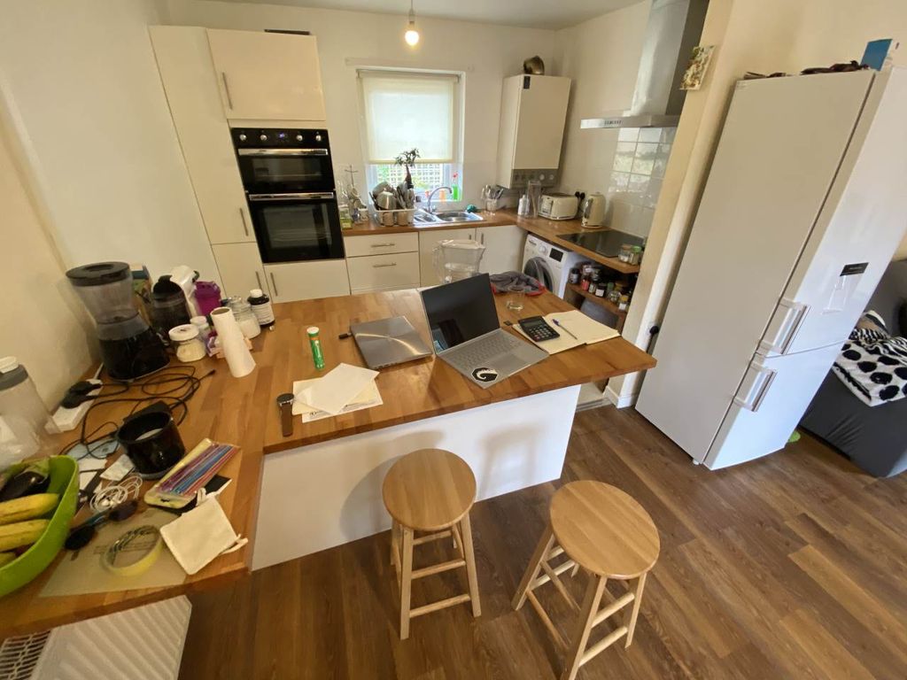 Property photo 2 of 8 Kitchen Area