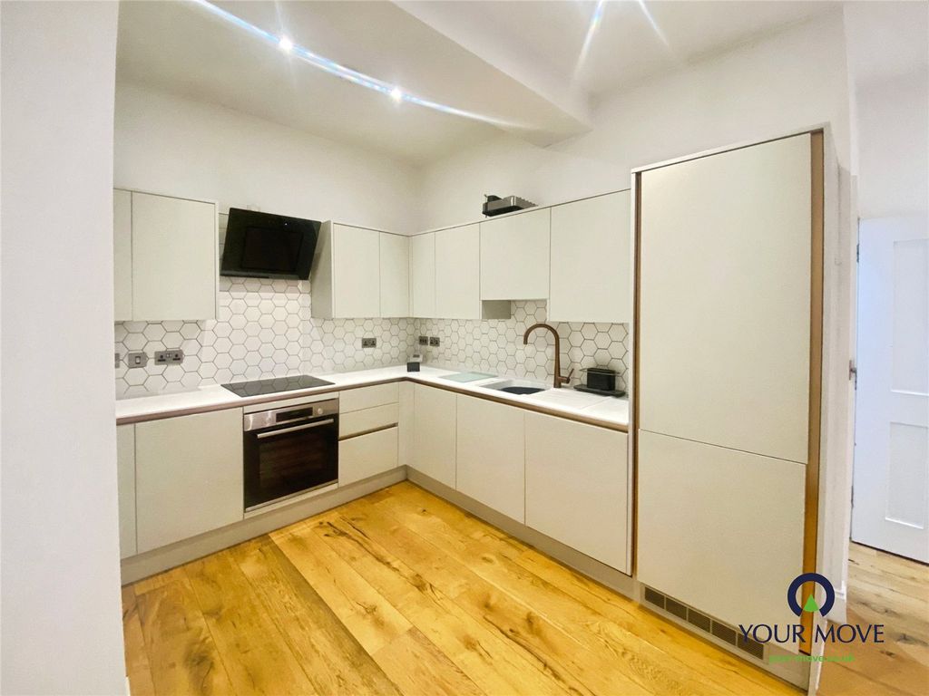 Property photo 2 of 9 Kitchen Area