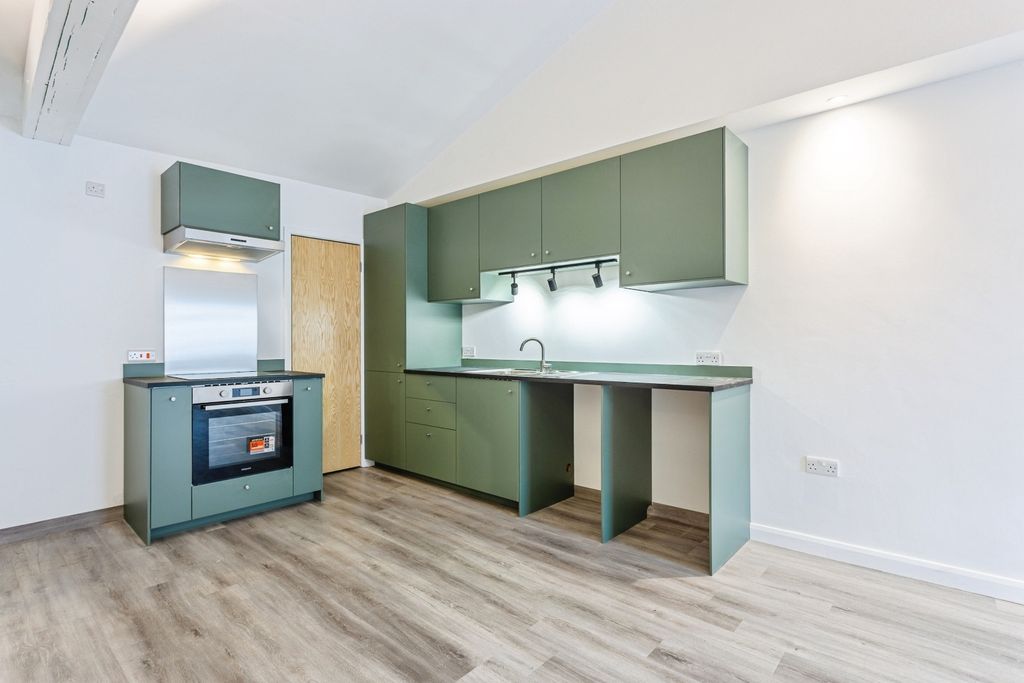 Property photo 3 of 6 Kitchen Living