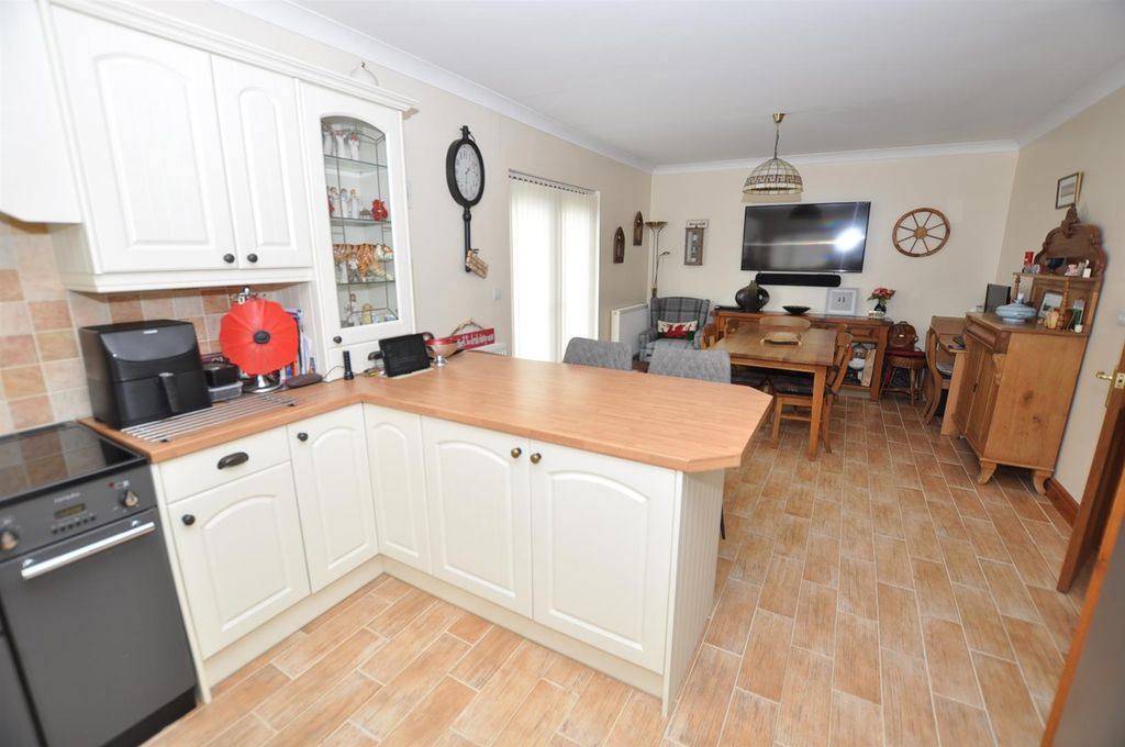 Property photo 2 of 21 Kitchen/Dining/Family Room