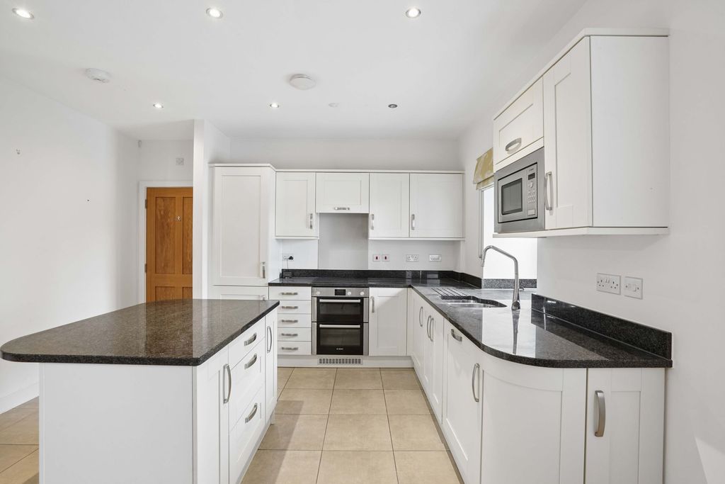 Property photo 3 of 13 Kitchen/Dining/Living Room