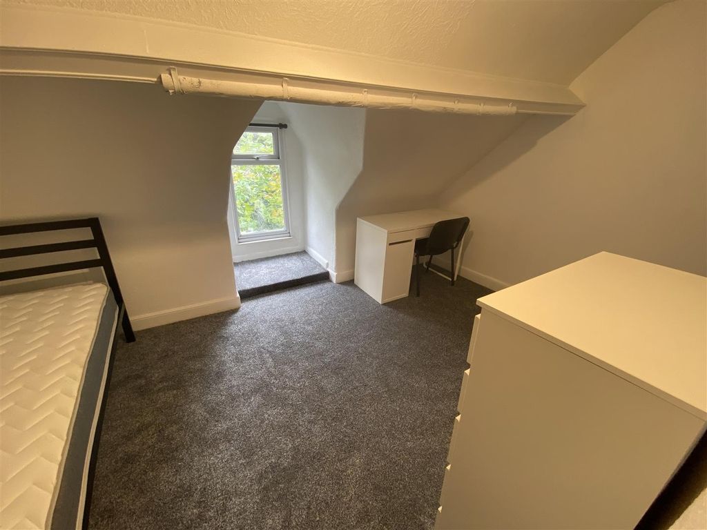 Property photo 3 of 6 Bright Attic Bedroom With A Desk And Leafy View...