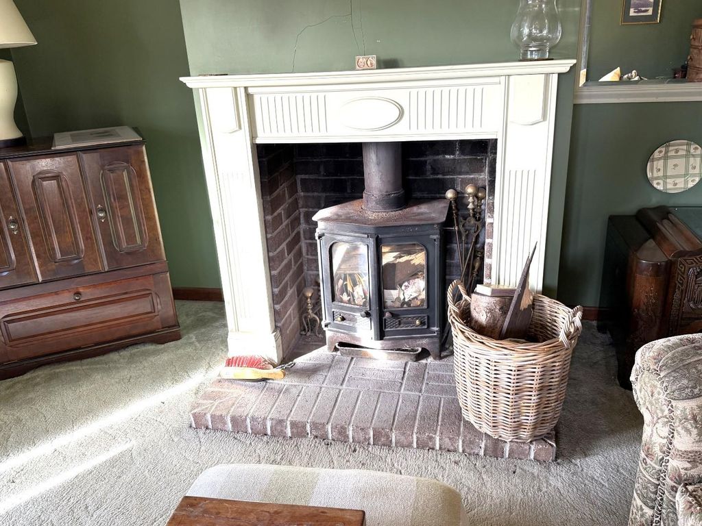 Property photo 3 of 12 Fireplace Lr.Jpg