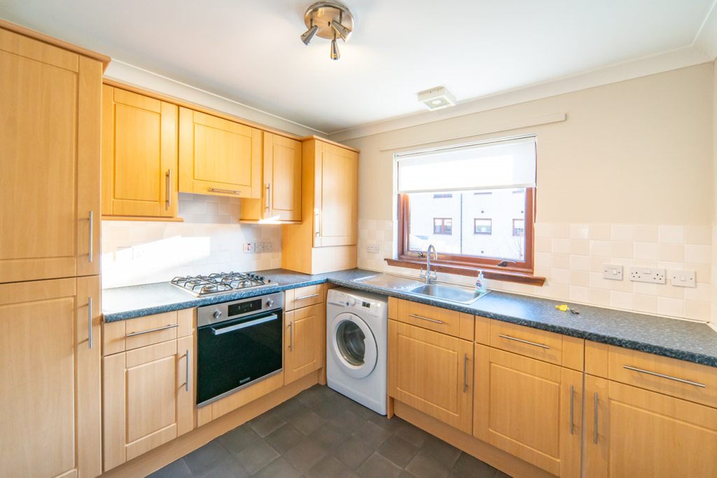 Property photo 3 of 7 Kitchen