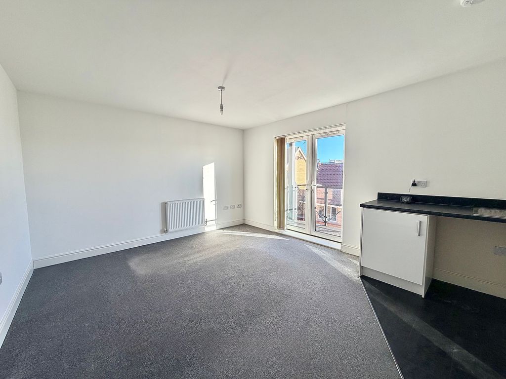 Property photo 3 of 9 Living Area