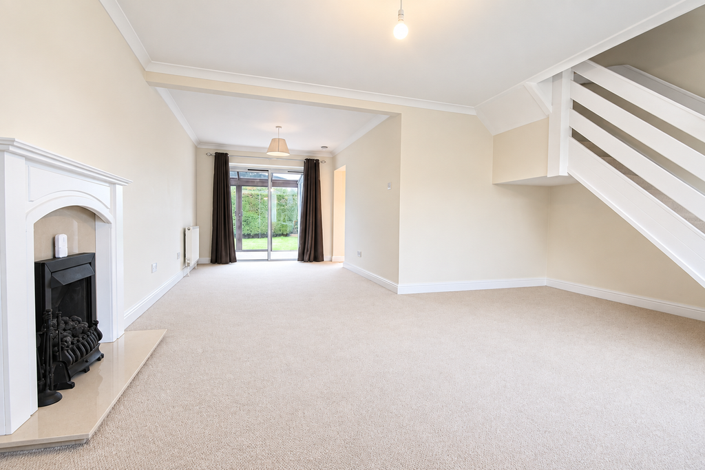 Property photo 3 of 11 Living Room - Angle 1