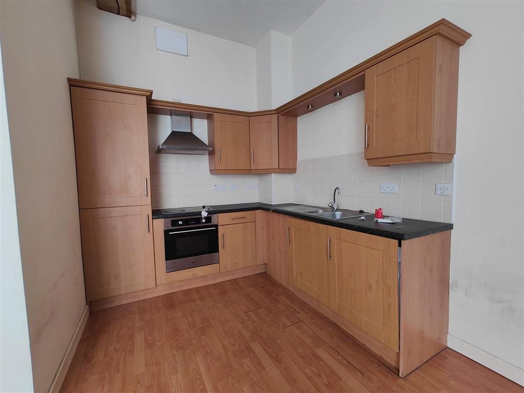 Property photo 3 of 11 Kitchen View