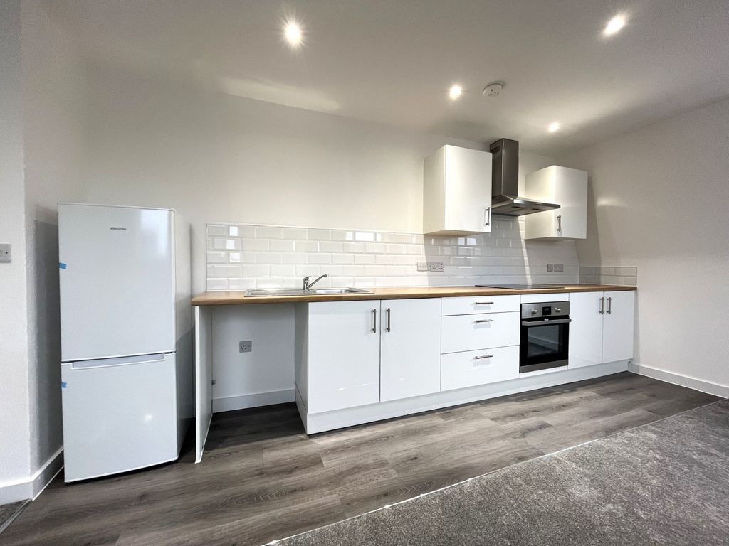 Property photo 3 of 8 Kitchen