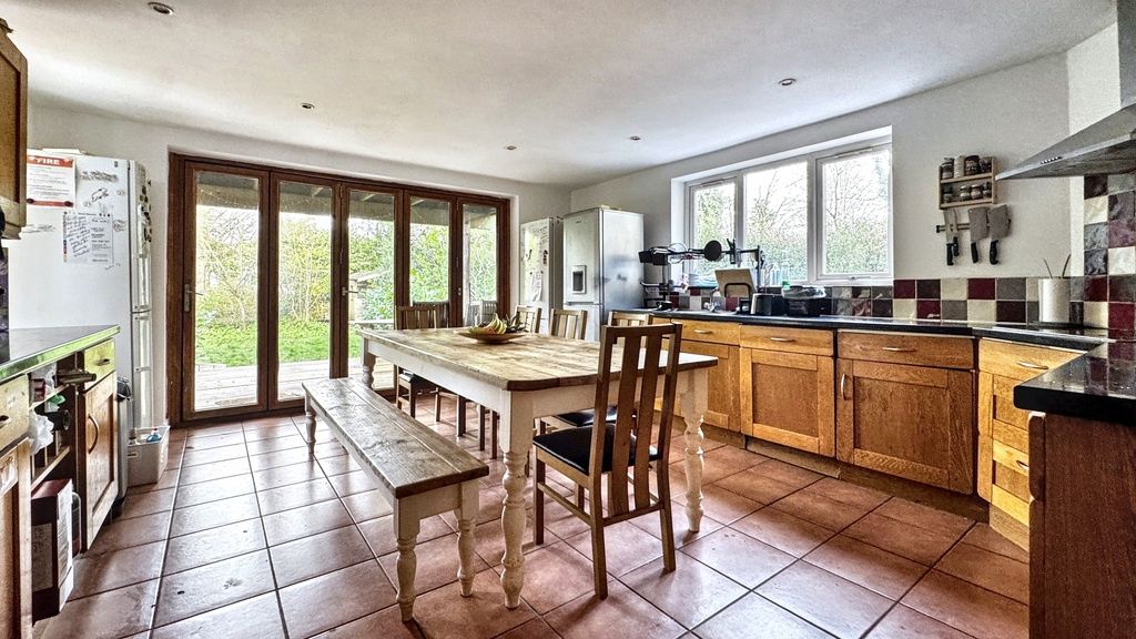 Property photo 2 of 15 Bright, Spacious Kitchen With Warm Wooden Cabinetr...