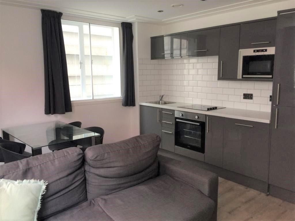 Property photo 3 of 4 Kitchen Dining Living Area (2).Jpg
