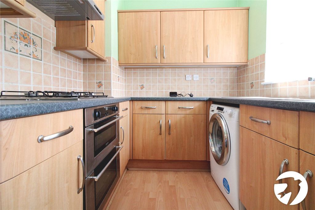Property photo 3 of 7 Kitchen