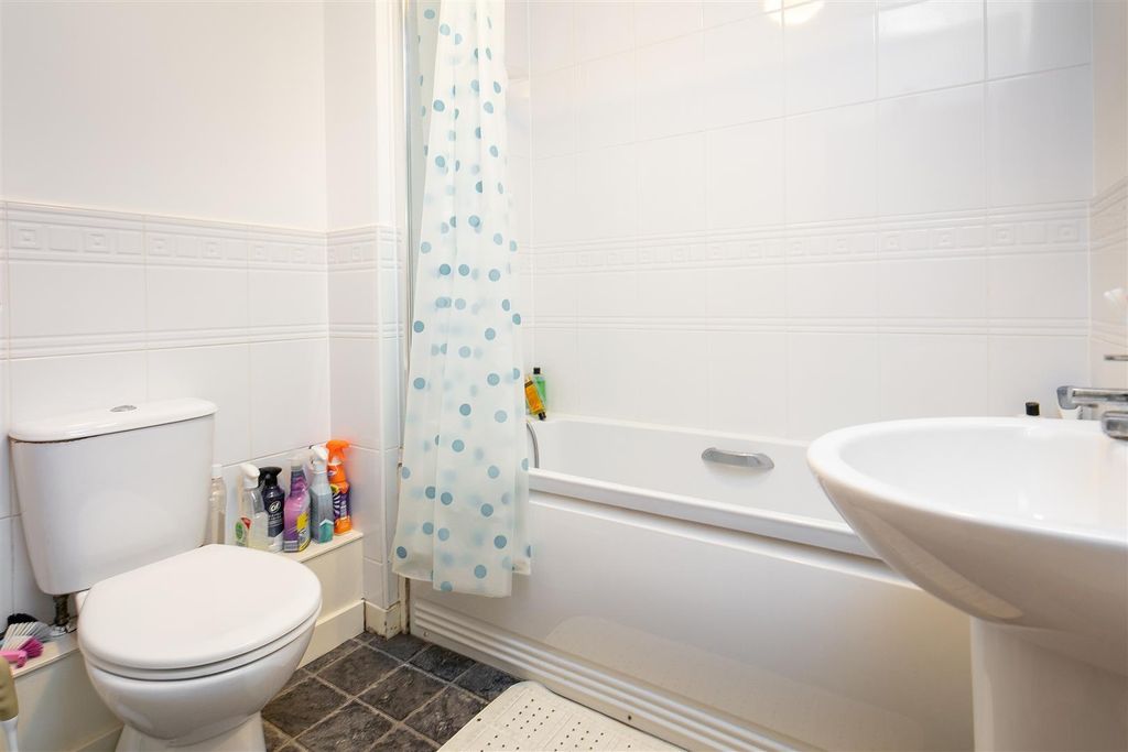 Property photo 2 of 9 Bright, Clean Bathroom With A White Bathtub, Pedes...