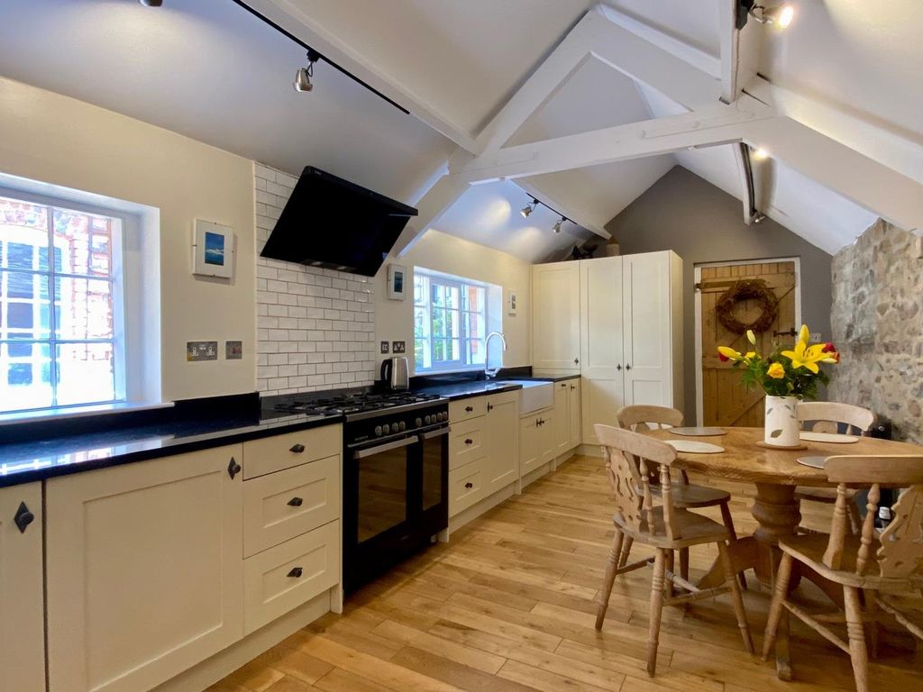 Property photo 3 of 38 Dining Kitchen