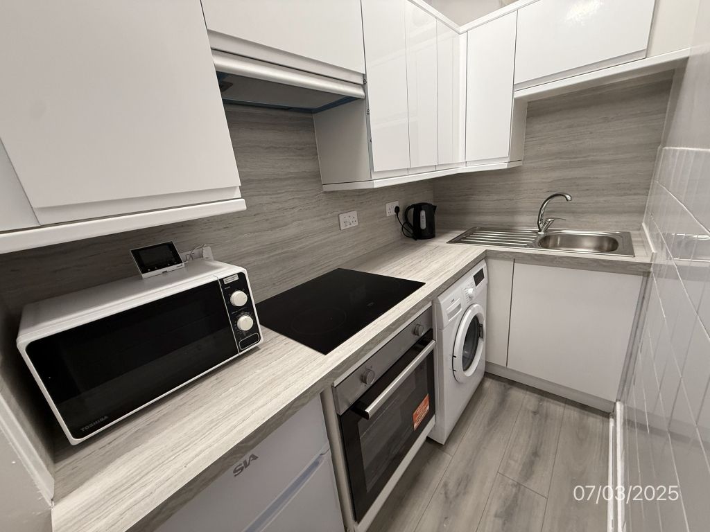 Property photo 2 of 12 Kitchen