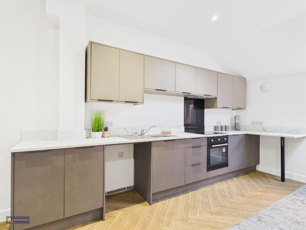 Property photo 2 of 7 Kitchen Area