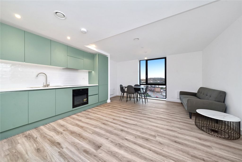 Property photo 1 of 11 Kitchen/Living Area
