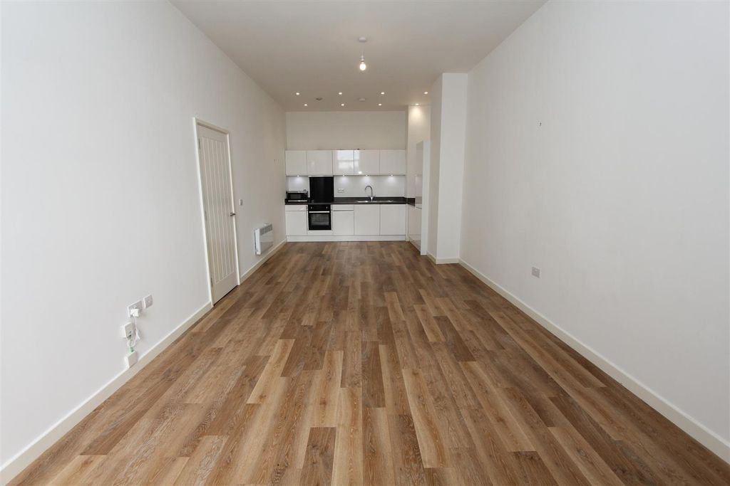 Property photo 1 of 11 Bright Open-Plan Living And Kitchen Area...