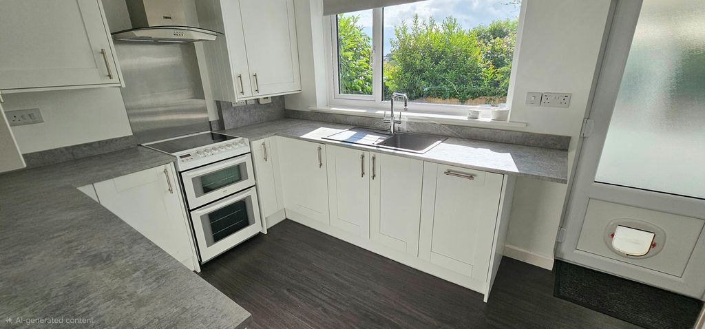 Property photo 3 of 17 Kitchen