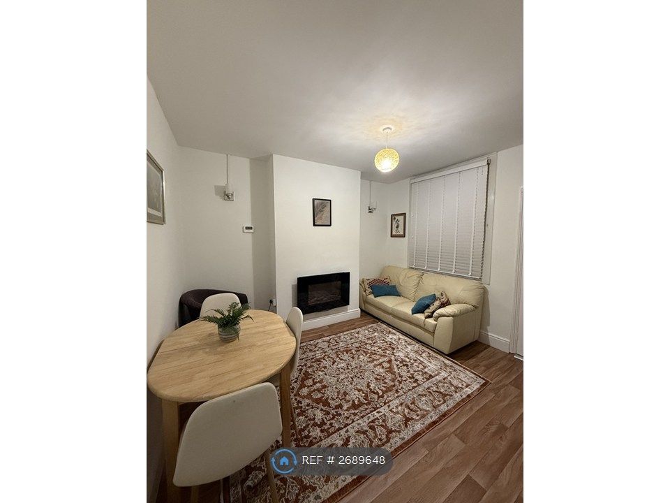 Property photo 3 of 8 Living Area