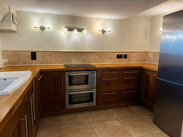 Property photo 2 of 12 Kitchen