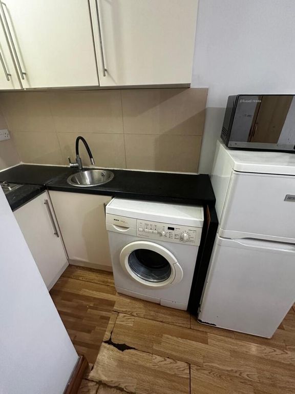 Property photo 2 of 6 Utility Room