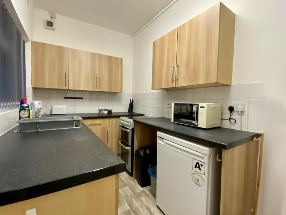 Property photo 3 of 8 Kitchen