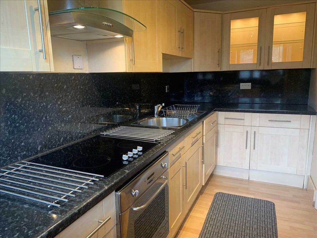 Property photo 3 of 7 Kitchen