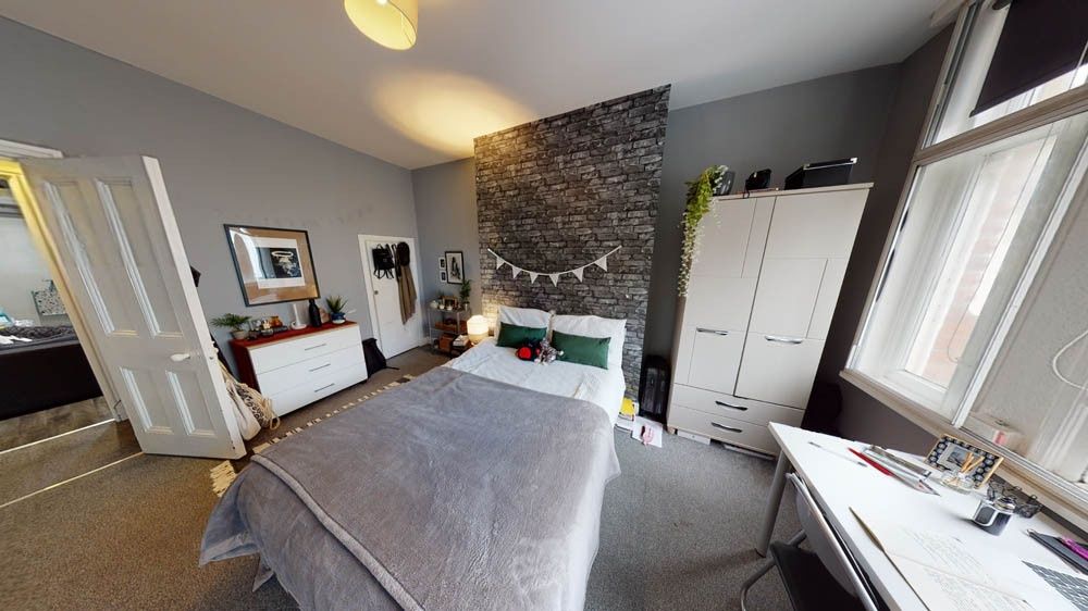 Property photo 1 of 5 A Bright And Welcoming Bedroom Featuring A Comfort...