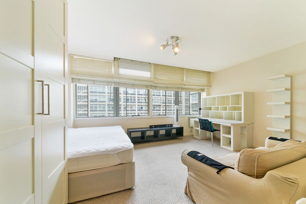 Property photo 1 of 8 Living Area