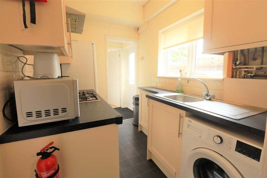 Property photo 3 of 13 Kitchen