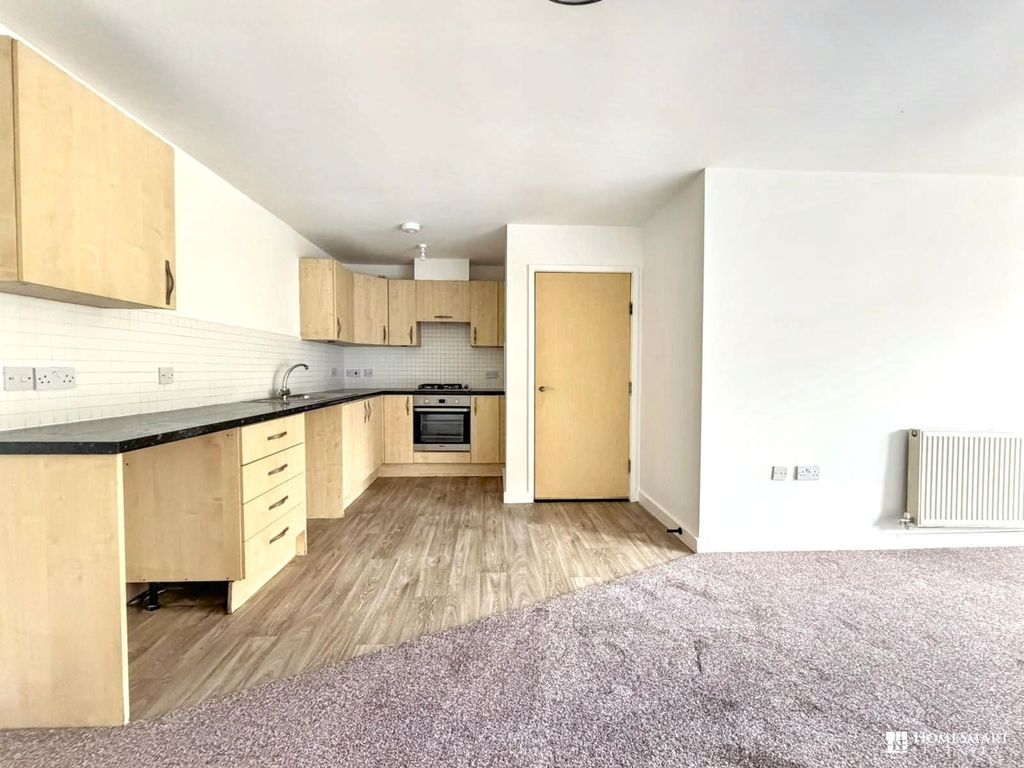 Property photo 3 of 12 Kitchen Lounge