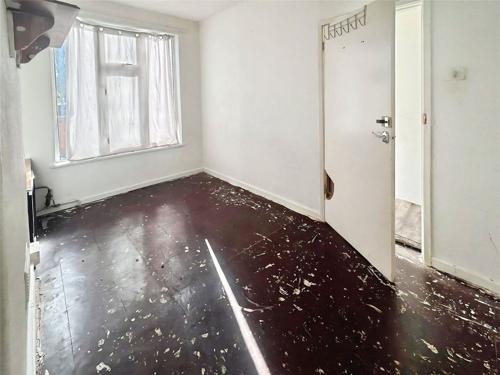 Property photo 3 of 13 Front Living Room