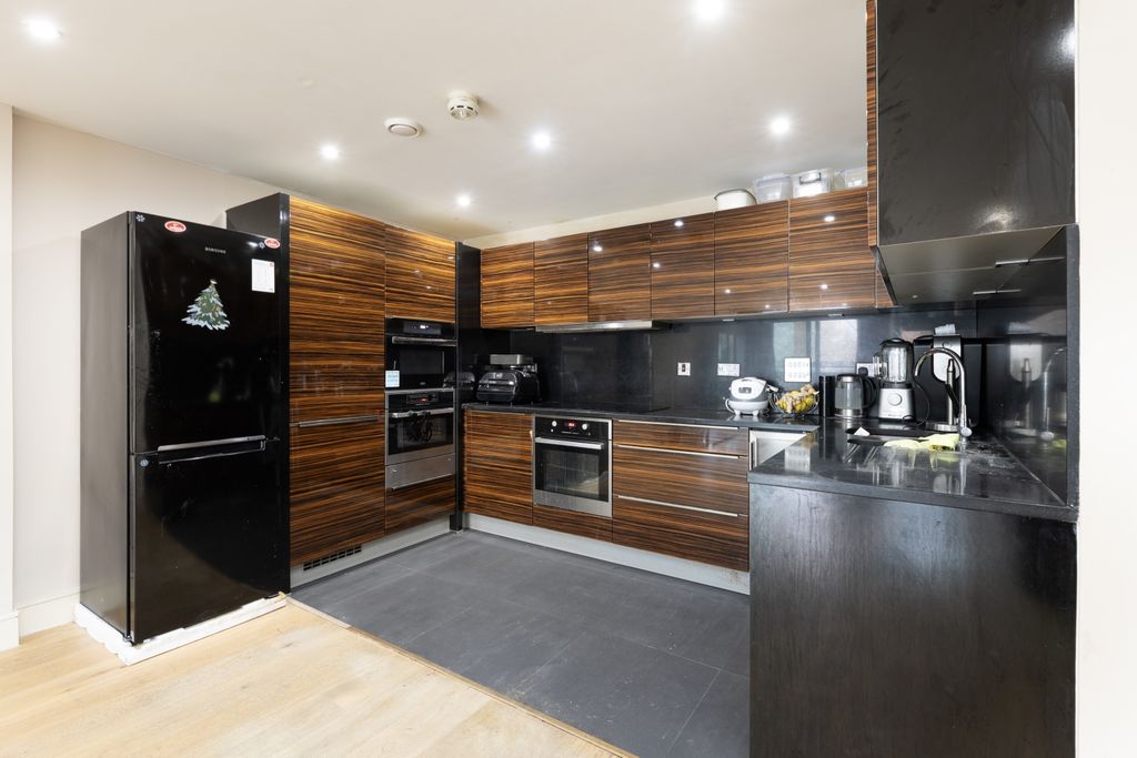 Property photo 1 of 8 Kitchen