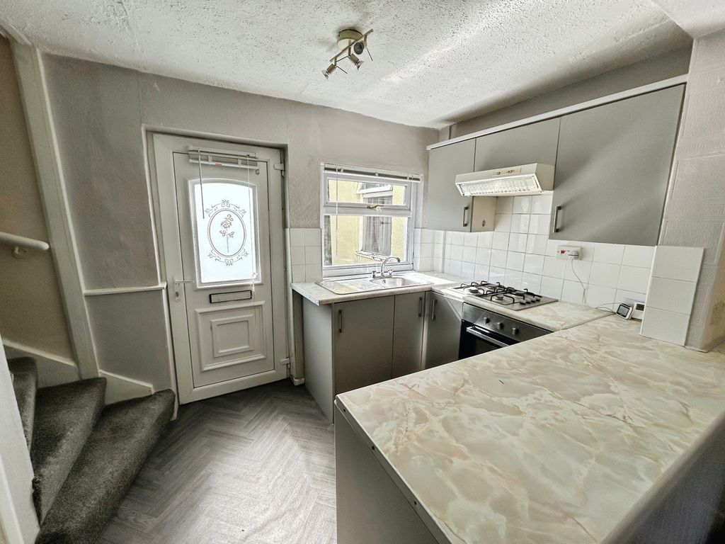 Property photo 3 of 10 Kitchen Area