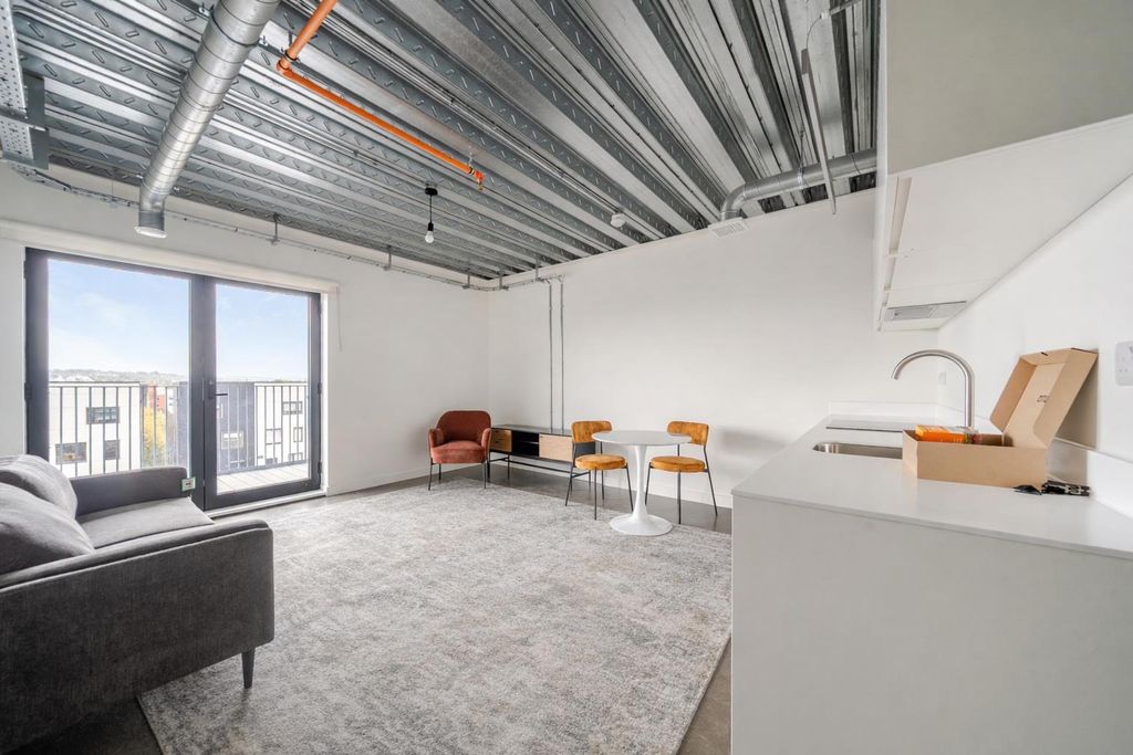 Property photo 1 of 11 Living And Kitchen.Png