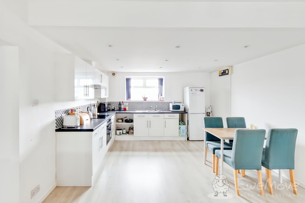 Property photo 1 of 12 Kitchen View