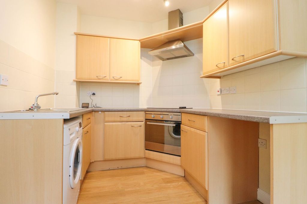 Property photo 3 of 9 Kitchen Area