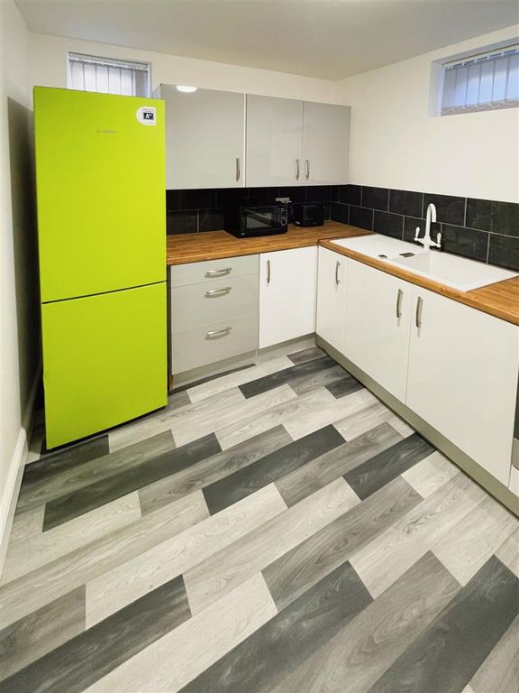 Property photo 2 of 13 Downstairs Kitchen