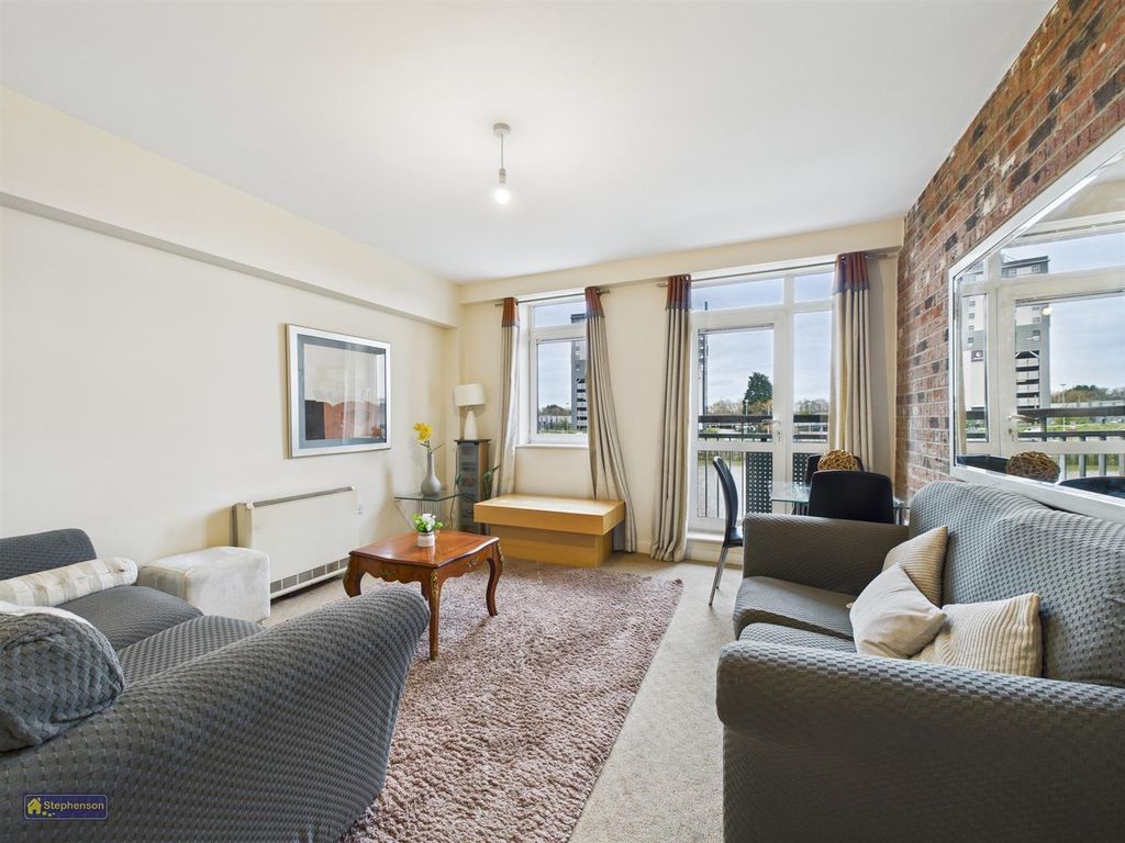 Property photo 2 of 8 Living Area