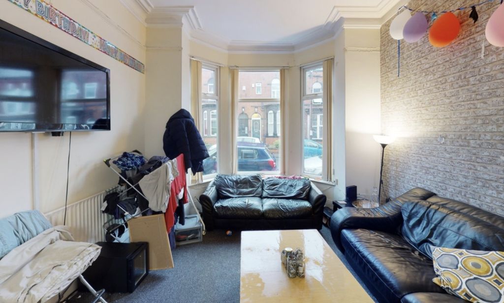 Property photo 3 of 4 A Bright And Cozy Living Room With Natural Light S...